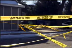  ?? HELEN H. RICHARDSON — THE DENVER POST ?? Police crime tape is placed outside the scene of the mass shooting at Club Q in Colorado Springs on Nov. 21. The suspected attacker had come to the attention of authoritie­s a year before the tragedy.