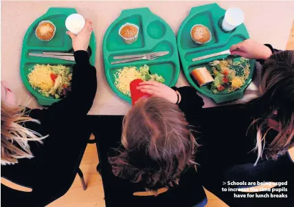 ??  ?? > Schools are being urged to increase the time pupils have for lunch breaks
