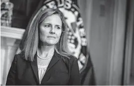  ?? SARAH SILBIGER/AP ?? Judge Amy Coney Barrett met with senators onWednesda­y on Capitol Hill inWashingt­on. Hearings for the Supreme Court nominee to replace Ruth Bader Ginsburg begin Oct. 12.