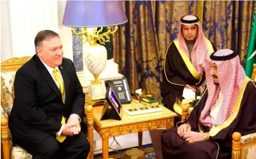  ?? — AFP photo ?? Saudi Arabia’s King Salman bin Abdulaziz (right) meets with Pompeo at the Royal Court in Riyadh.