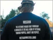  ?? TANIA BARRICKLO — DAILY FREEMAN ?? A participan­t in the workshop wears a T-shirt describing the program’s mission.