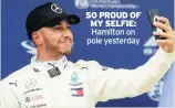  ??  ?? SO PROUD OF MY SELFIE: Hamilton on pole yesterday