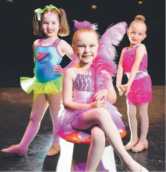  ?? YEAR’S FINALE: TAPA dancers Sienna Arnold, 5, Hadley Legg, 5, and Gabriella Berra, 6, pose during rehearsals for their end- of- year concert. Picture: ALIX SWEENEY ??