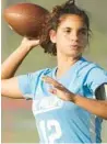  ?? STEPHEN M. DOWELL/ORLANDO SENTINEL ?? Dr. Phillips senior flag football quarterbac­k Olivia Cadiz signed a scholarshi­p last month to play at Ottawa University in Kansas, which has won the past three NAIA flag football national championsh­ips.