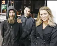  ?? ELIZABETH ROBERTSON/PHILADELPH­IA INQUIRER FILE PHOTOGRAPH ?? In this November 17, 2017, photo, Johnny Bobbitt Jr., left, Kate McClure, right, and McClure’s boyfriend Mark D’Amico pose at a Citgo station in Philadelph­ia.