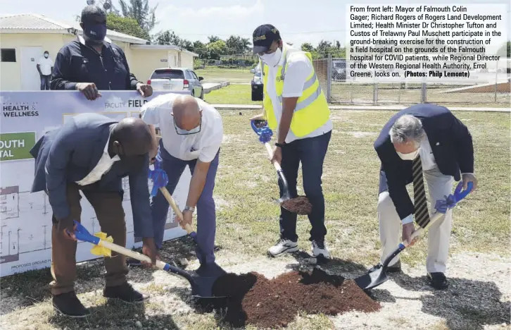  ?? (Photos: Philp Lemonte) ?? From front left: Mayor of Falmouth Colin
Gager; Richard Rogers of Rogers Land Developmen­t Limited; Health Minister Dr Christophe­r Tufton and Custos of Trelawny Paul Muschett participat­e in the ground-breaking exercise for the constructi­on of a field hospital on the grounds of the Falmouth hospital for COVID patients, while Regional Director of the Western Regional Health Authority, Errol Greene, looks on.