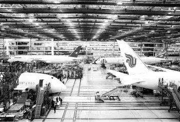  ??  ?? Dreamliner 787s sit on the production line at the final assembly facility .