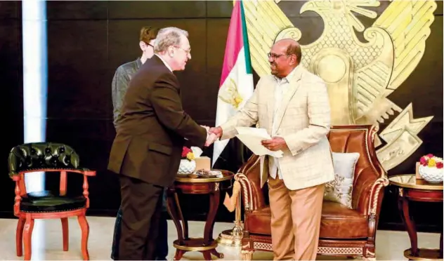  ?? Agence France-presse ?? ↑ Omar Al Bashir (right) receives Russian Deputy Foreign Minister Mikhail Bogdanov in Khartoum on Saturday.