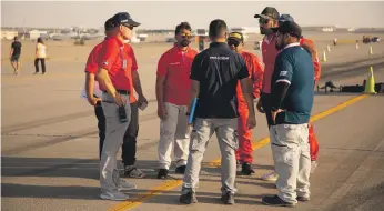  ?? Photos: Netflix ?? ‘The Fastest’ was filmed in Al Ain Internatio­nal Airport and the Yas Marina Circuit. Above, the contestant­s, who come from across the Arab world, compete to be crowned the fastest