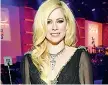  ??  ?? Canadese La cantante canadese Avril Lavigne, 33 anni, ha scritto successi come «Complicate­d» e «My Happy Ending»