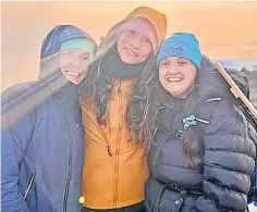  ?? ?? Summit special Hannah, Roxanne and Mhairi at the Ben Nevis peak