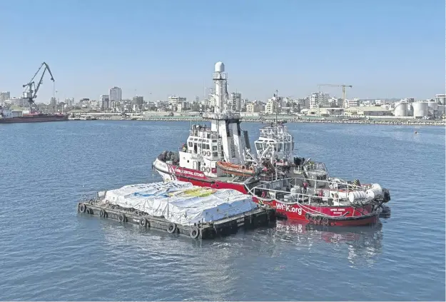  ?? ?? The Open Arms – a ship operated by the Proactiva Open Arms charity – preparing to leave Larnaca in Cyprus yesterday transporti­ng 200 tonnes of food for Gaza using a new ‘maritime corridor’