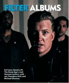  ?? ?? Evil eyes: Queens Of The Stone Age’s Josh Homme (centre), with Jon Theodore (left) and Michael Shuman.