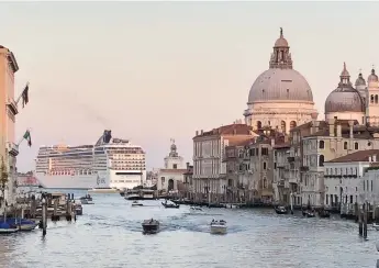 ?? Barbara Ellis, The Denver Post ?? A view from the Grand Canal as a cruise ship enters the Giudecca Canal in Venice’s historic center, in September 2019.