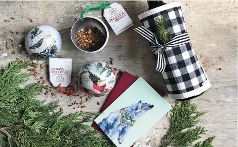  ??  ?? Stratford Christmas Trail Gifts: Michel Designs Vintage Tin Ornament filled with mulling spices from Bradshaws, All is Bright Ashforth Press Polar Bear Card from DISTILL & Festive Ten and Co holiday Swedish Sponge from Wills & Prior. Photo by...