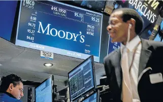  ?? /Reuters ?? Economic blues: Moody’s downgraded SA on Friday night, and on Tuesday cut the ratings of the big banks and insurance companies, saying it expected zero growth in the coming year despite government forecasts of about 1% growth in GDP.
