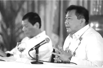  ?? PPD / Toto Lozano, File photo ?? File photo from Malacañang shows former President Rodrigo Duterte (background) and Rep. Pantaleon Alvarez (foreground).