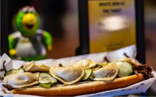  ?? Lucy Schaly/Post-Gazette ?? New foods for the Pittsburgh Pirates season at PNC Park include the Renegade Dog.