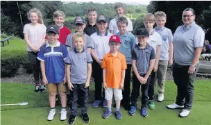  ??  ?? Abbie Cowlard with junior golfers at Reddish Vale