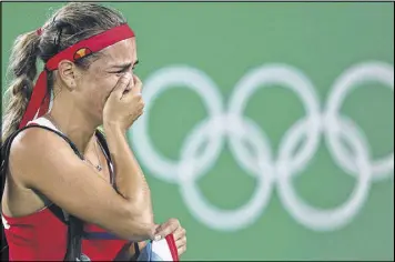  ?? VADIM GHIRDA / ASSOCIATED PRESS ?? It’s an emotional moment for tennis star Monica Puig at Rio de Janeiro as she becomes Puerto Rico’s first Olympic gold medalist in any sport.