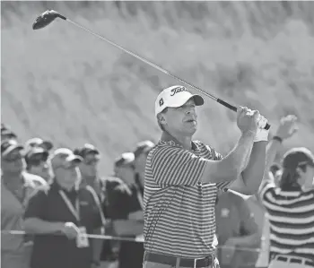  ?? / MILWAUKEE JOURNAL SENTINEL ?? Steve Stricker of Madison watches his drive on the first tee as he starts his third round at the U.S Open on Saturday.