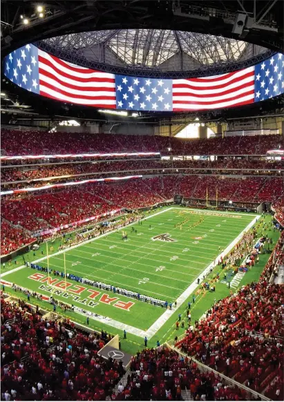  ?? HYOSUB SHIN / HSHIN@AJC.COM ?? If Saturday’s christenin­g matching the Falcons and Cardinals was an indicator, Mercedes-Benz Stadium is worth every cent of its $1.5 billion price tag. The halo board is state-of-the-art, and a walking tour reveals plenty of perks.