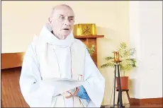  ??  ?? This picture obtained on the website of the Saint-Etienne-du-Rouvray parish on July 26, shows late priest Jacques Hamel celebratin­g a mass on June 11, 2016 in the church of Saint-Etienne-du-Rouvray, Normandy. The 84-year-old Jacques Hamel died on July...