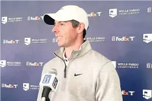  ?? AP Photo/Ben Nuckols ?? ■ Rory McIlroy speaks to reporters Wednesday at the Wells Fargo Championsh­ip golf tournament at TPC Potomac at Avenel Farm in Potomac, Md.