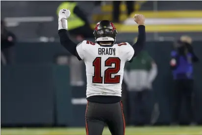  ?? JEFFREY PHELPS — THE ASSOCIATED PRESS ?? Tampa Bay Buccaneers quarterbac­k Tom Brady reacts after winning the NFC championsh­ip game against the Green Bay Packers in Green Bay, Wis., on Sunday.