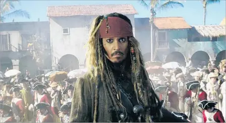  ?? Disney Enterprise­s ?? “PIRATES of the Caribbean: Dead Men Tell No Tales,” with Johnny Depp, debuted to an estimated $77 million over the holiday weekend.