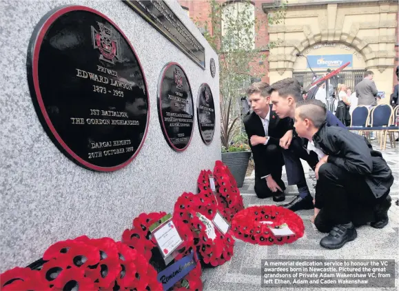  ??  ?? A memorial dedication service to honour the VC awardees born in Newcastle. Pictured the great grandsons of Private Adam Wakenshaw VC, from left Ethan, Adam and Caden Wakenshaw