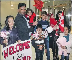  ?? WEEKLY PRESS FILES ?? Members of the Barho family arrive in Halifax on Sept. 29 2017. Seven children died early yesterday.
