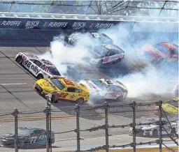  ?? AP ?? Alex Bowman (48), Joey Logano (22), Austin Cindric (2), Justin Allgaier (62) and Ty Gibbs (23) are involved in a crash in Turn 1 during Sunday’s NASCAR Cup series race in Talladega, Ala.