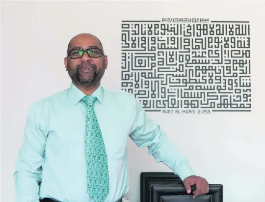  ?? Christophe­r Pike / The National ?? Nooruddin Matheranwa­la, a banker based in Sharjah, says he is now digging into his savings to keep up with the rising cost of supporting a family.