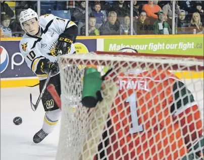  ?? JEREMY FRASER/CAPE BRETON POST. ?? Ross MacDougall of the Cape Breton Screaming Eagles fires a shot on Alexis Gravel of the Halifax Mooseheads during first period Quebec Major Junior Hockey League action at Centre 200 on Friday. Cape Breton won the game 4-1.