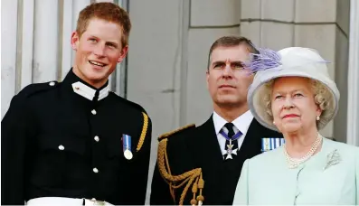  ?? ?? Veterans: Harry and Andrew wear military uniforms to watch a flypast with the Queen in 2005