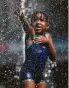  ?? AFP / Getty Images ?? Amid Europe’s heat wave, a girl plays in a fountain in Brussels.