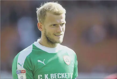  ??  ?? Barnsley captain Adam Davies feels that the high standards expected of the players in training can only be good for the team’s future.