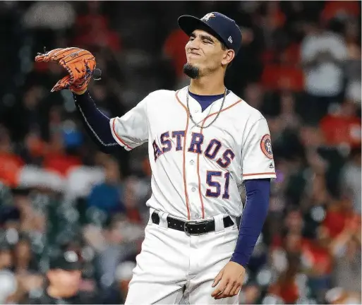  ?? Karen Warren / Staff photograph­er ?? BREWERS 6, ASTROS 3 (14) The Astros got six innings of sterling relief pitching before Cionel Perez yielded a two-run homer to the Brewers’ Mike Moustakas in the 14th inning.