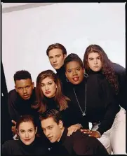  ?? CHRIS CARROLL/MTV/TRIBUNE NEWS
SERVICE ?? Julie Gentry (center) back in the early 1990s with her ‘Real World’ Season 1 castmates.