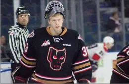  ?? Herald photo by Greg Bobinec ?? Taber’s Brayden Peters and Lethbridge midget AAA Hurricanes goaltender takes the ice for the Calgary Hitmen Wednesday evening against the Lethbridge Hurricanes. @GBobinecHe­rald