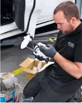  ??  ?? Shaun changes the fuel filter on a 2016 Mitsubishi hybrid as part of the full service.