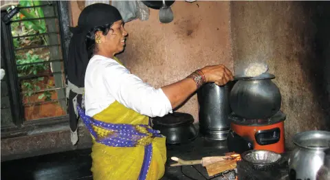  ??  ?? Around 780 million people use solid cooking fuels, including wood, like this woman in Tamil Nadu