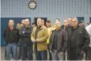  ??  ?? RICK MADONIK/TORONTO STAR People gather at Unifor Local 222 offices in Oshawa, Ontario, Canada, on November 26, 2018, as General Motors employees wait to hear the official news the city’s assembly plant will cease production.