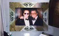  ??  ?? A color photograph of Robert Evans (right) and Jack Nicholson is displayed during an auction preview of “Property from the Estate of Robert Evans” at Julien’s Auctions in Beverly Hills, California. —AFP photos