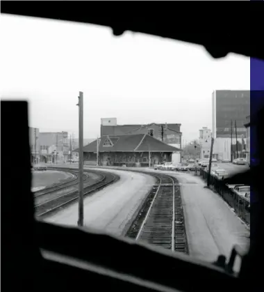  ?? Jay Williams ?? Lafayette’s joint NKP-NYC station is framed in the windshield of an E unit on the westbound Riley. The depot, relocated to a new alignment, serves Amtrak today.