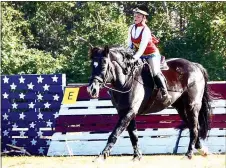  ?? Submitted Photo ?? Alyx Swope-Bell rode Sherman, a rescue horse owned by Justin Doran, during the Horses for Healing Turkey Trot Cross Country Fun Day in Highfill on Nov. 20. Swope was one of 12 riders who traveled from Legends Equestrian Center near Decatur to the...