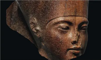  ??  ?? The brown quartzite head is expected to sell for more than £4m at Christie’s. Photograph: Christie's