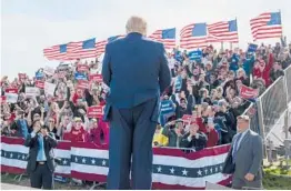  ?? TERRY RATZLAFF/THE NEW YORK TIMES ?? A draft document revealed dozens of hedge funds investing in former President Trump’s social media company. Above, Trump in Nebraska.