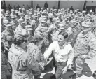  ?? ROSS D. FRANKLIN/AP ?? Arizona Gov. Doug Ducey meets National Guard soldiers Monday in Phoenix.